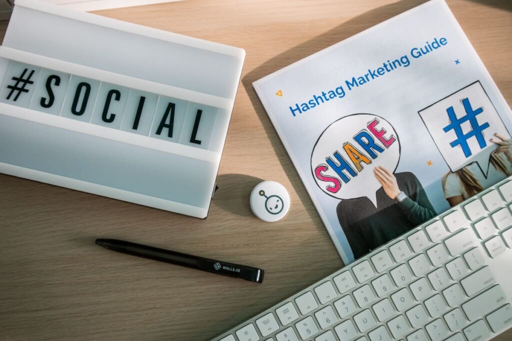 Social media hashtag marketing guide flat lay with keyboard